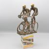 loek bos  achtervolging  drie wielrenners  brons  met acryl beschilderd  semi unicum  xs17x23 cm. 2150 00 3   31