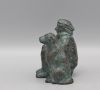karin beek  vrouw  zittend   met hond  brons   x x 8 cm. e. 495 00   23