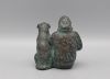 karin beek  vrouw  zittend   met hond  brons   x x 8 cm. e. 495 00  22